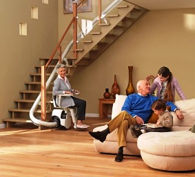 Senior 55+ woman in curved stair lift - Atlanta